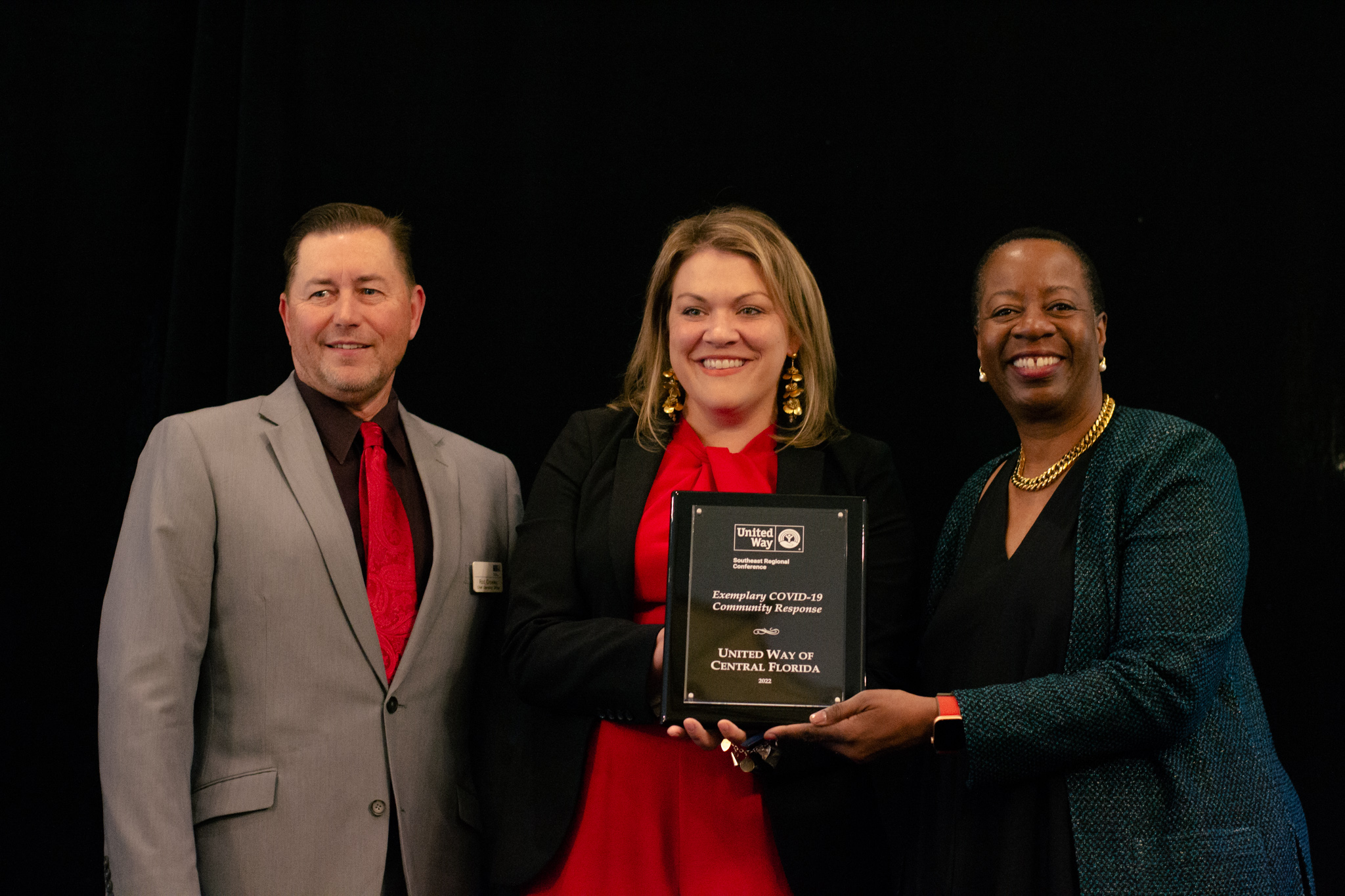 2022 SERC Awards - Angela Williams, UWW Pres. & CEO, presenting United Way of Central Florida, represented by Christina Criser Jackson (CEO) and Rod Crowley (COO), with the "Exemplary COVID-19 Community Response" award (April 2022)