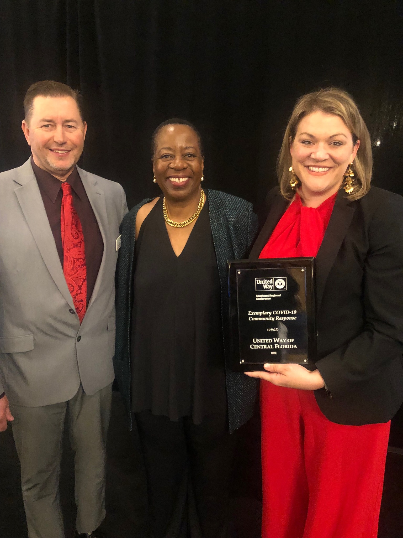 2022 SERC Awards - Angela Williams, UWW Pres. & CEO, presenting United Way of Central Florida, represented by Christina Criser Jackson (CEO) and Rod Crowley (COO), with the "Exemplary COVID-19 Community Response" award (April 2022)