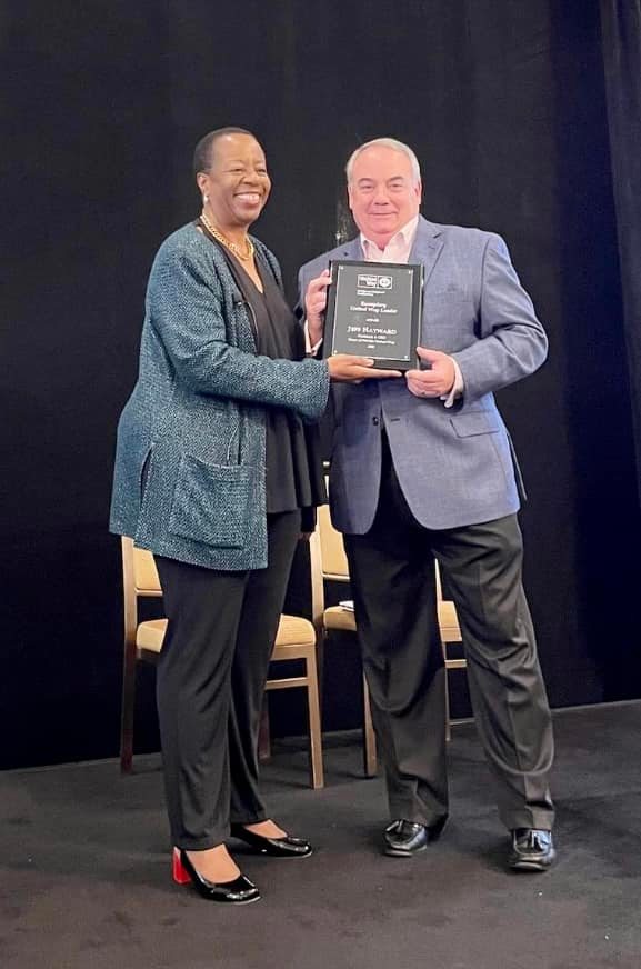 2022 SERC Awards - Angela Williams, UWW Pres. & CEO, presenting Jeff Hayward (CEO, HFUW) with the "Exemplary UW Leader" award (April 2022)