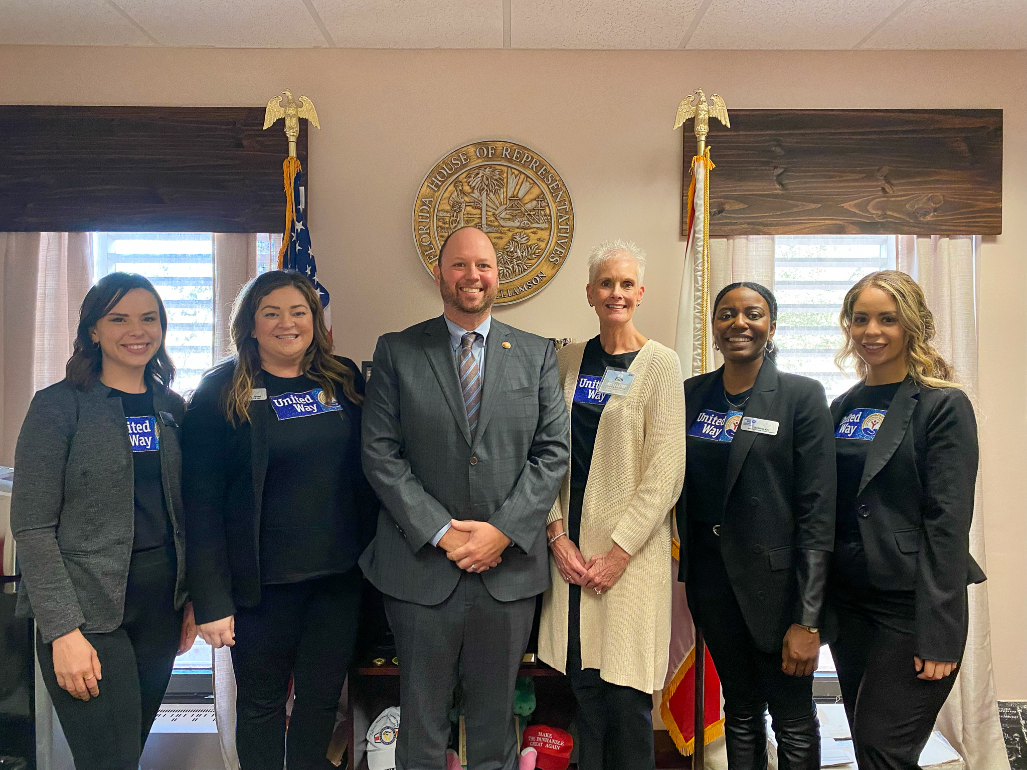 Rep. Jayer Williamson with UWEC volunteers and staff