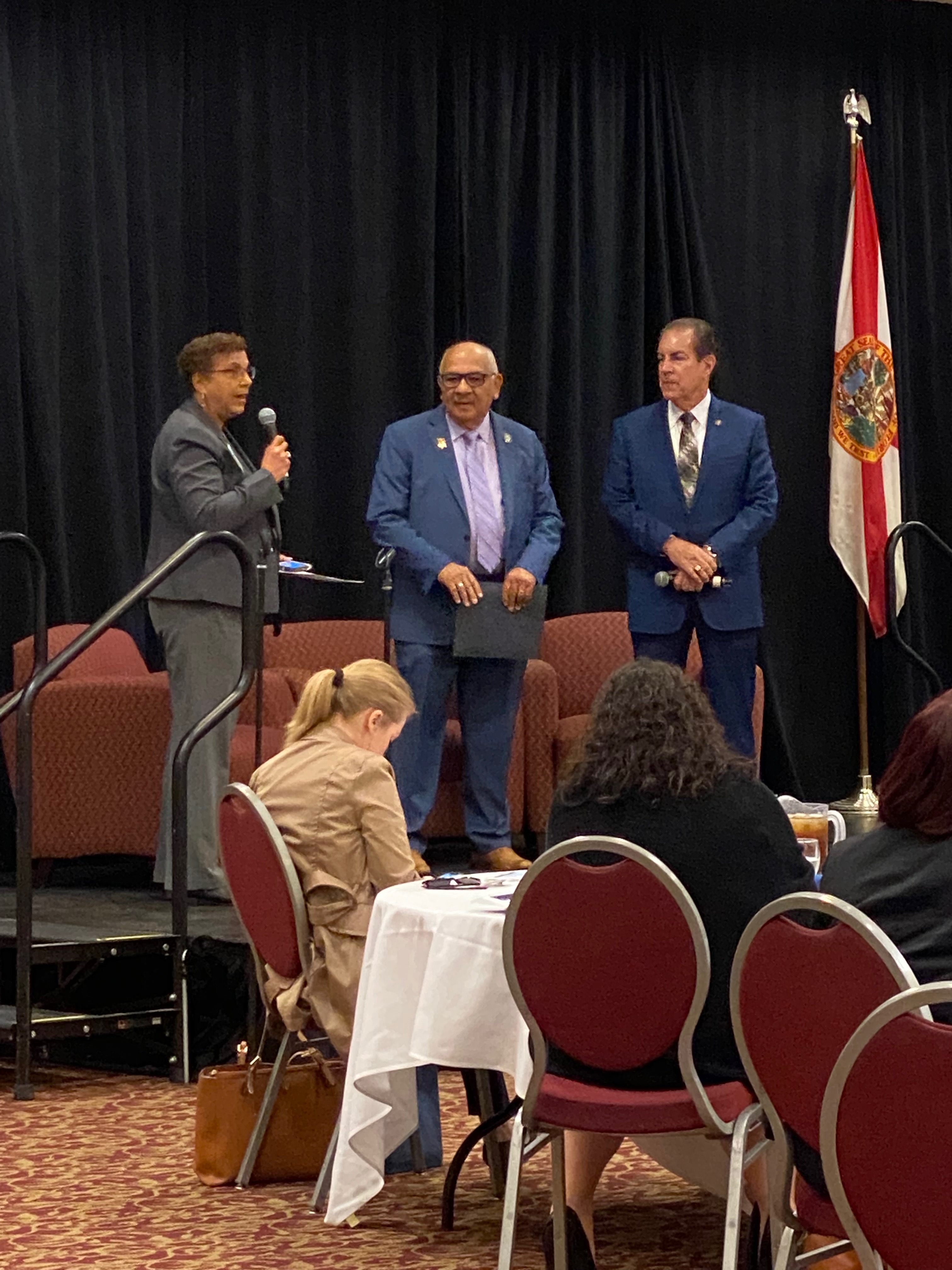 Laura Whitfield, UW Miami, introduces Senators Tom Wright and Victor Torres, Jr.